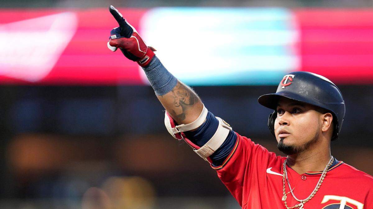Minnesota Twins’ Luis Arraez points to the dugout after hitting a single against the Kansas City Royals during the second inning of a baseball game, Tuesday, Sept. 13, 2022, in Minneapolis. On Friday, Jan. 20, 2023, the Twins traded reigning AL batting champion Arraez to the Miami Marlins for a three-player package featuring starting pitcher Pablo López.