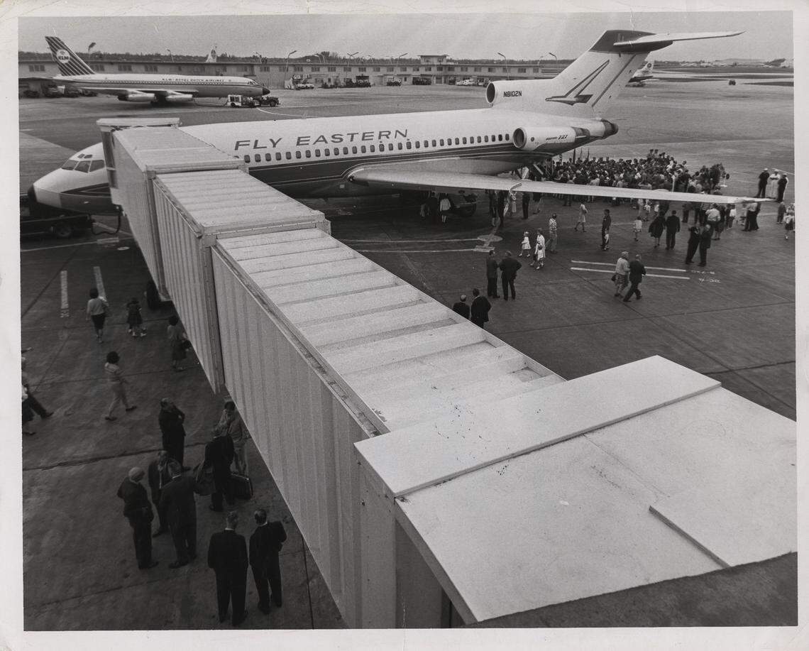 A new jetway leading into an Eastern Airlines plane.
