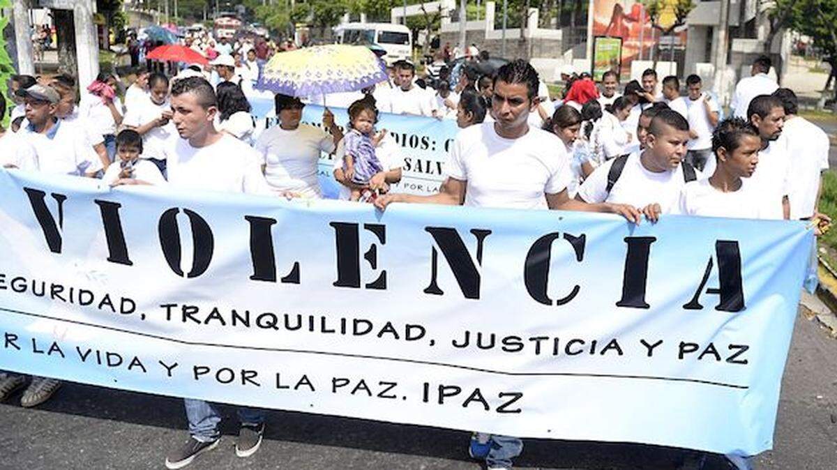 Activists in San Salvador march for peace in 2015. President Nayib Bukele says he has made safety and security in Salvadoran society a priority.