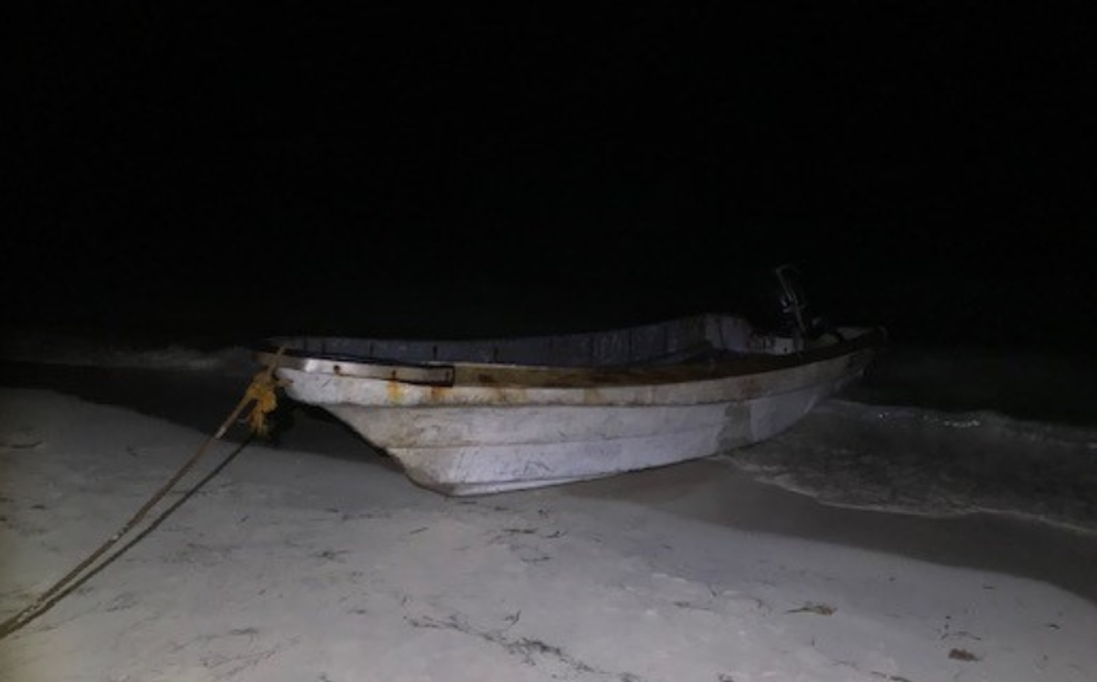 A boat rests on Key Colony Beach on either Feb. 16 or 17, 2020. The vessel carried migrants who were arrested by U.S. Border Patrol agents.