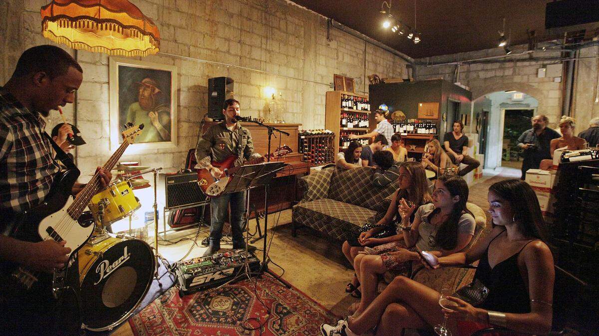 Musicians play at Lagniappe in the city of Miami. Restaurants in Miami Beach typically have to get a special permit to host live music.