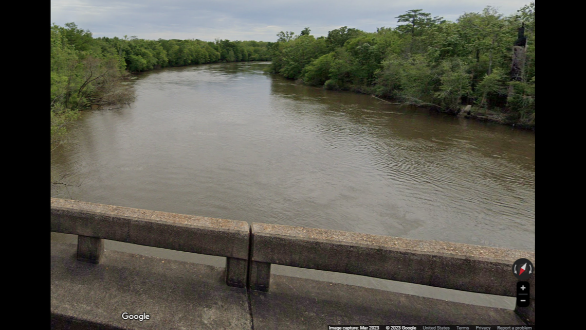 The man was thrown over a bridge into the Escambia River by a woman and her boyfriend he met online, Florida deputies said.