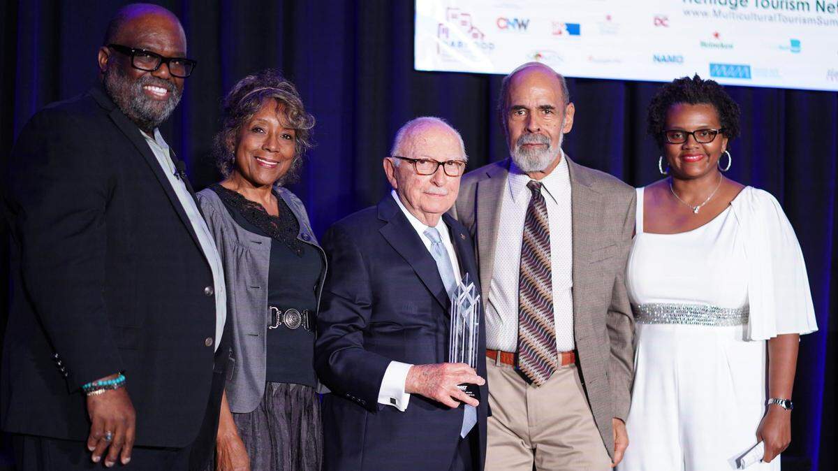 Andy Ingraham, Gloria Herbert, Rocco M. Angelo, Solomon Herbert and Erinn D. Tucke at the Apex Award Ceremony at the National Association of Black Hotel Owners, Operators and Developers conference, recently held in Miami.