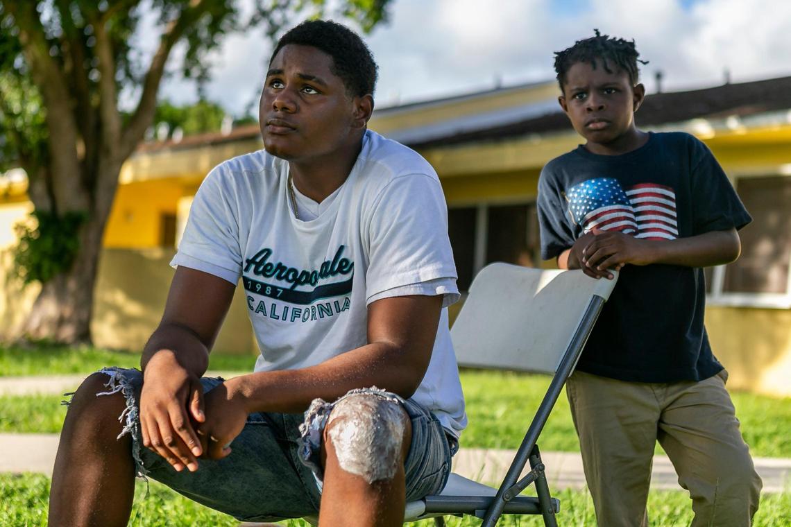 Tavon Jones, 19, and his brother, Damion Hickson, 9, were outside of their home at the Pine Island apartment complex in Princeton, Florida on Saturday, Oct. 31, 2020. Some residents say they have experienced sluggish mail delivery in recent months, and that their mail-in ballots could have been affected.