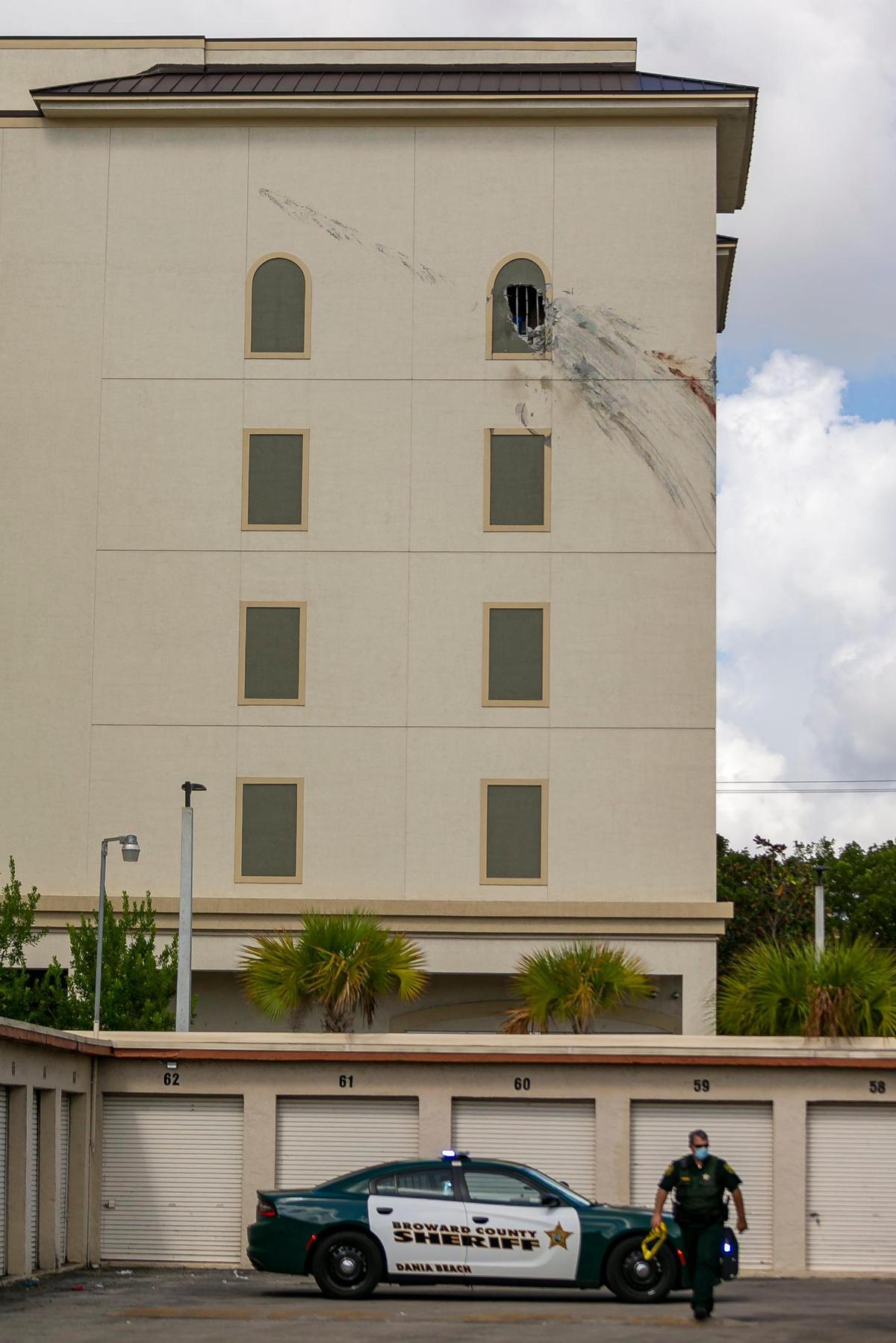 Police and fire rescue respond to an accident in South Broward where a small twin-engine plane crashed into a storage building on Friday, August 28, 2020.