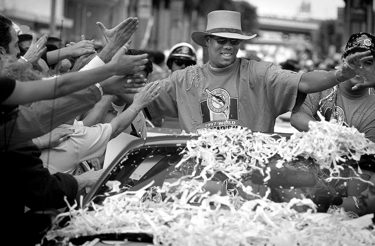 10/28/97 -- Photo by DAVID BERGMAN/Herald Staff -- Florida Marlins WORLD CHAMPS parade in downtown Miami -- World Series Most Valuable Player Livan Hernandez greets the crowd during the parade on Flagler street.