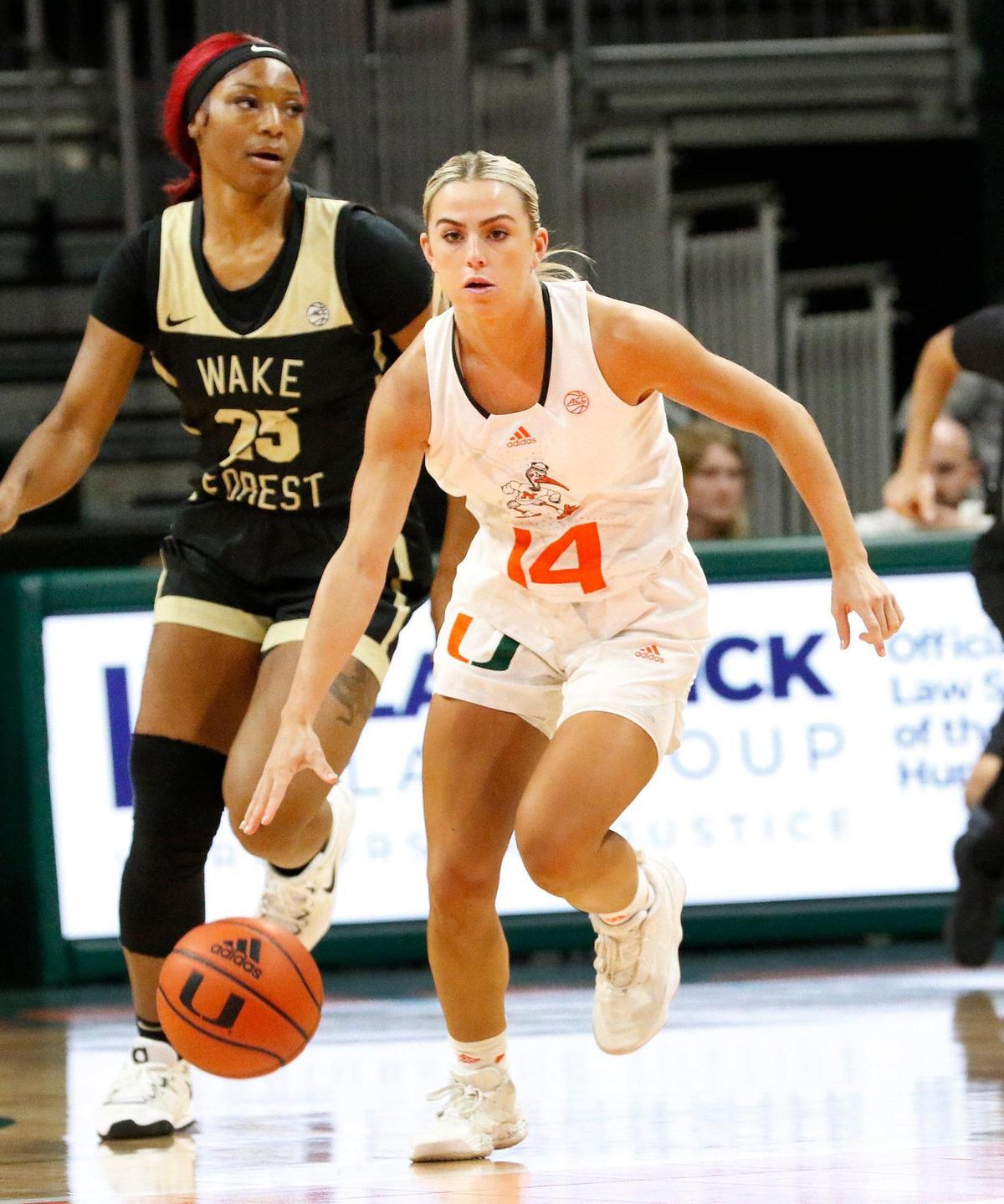UM Hurricanes Haley Cavinder (14) dribbles upcourt during NCAA women’s basketball game agains Wake Forest on Sunday, January 15, 2023 at Watsco Center in Coral Gables. Andrew Uloza / for Miami Herald