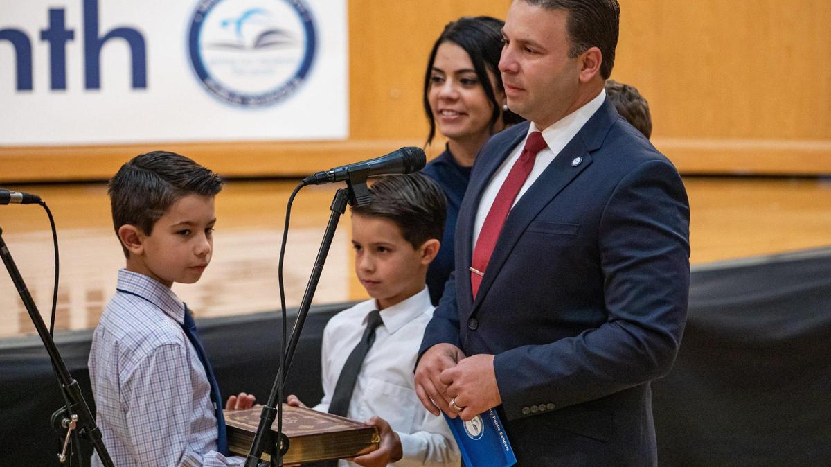 Danny Espino is sworn in at the Miami-Dade County School Board Administration Building in Miami, Florida on Tuesday, November 22, 2022.