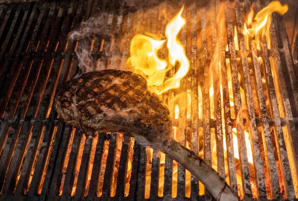 Papi Steak, Restaurant in Miami Beach serves a $1,000 Wagyu tomahawk steak that is presented to the table in a briefcase. The steak is prepared in the kitchen before serving.