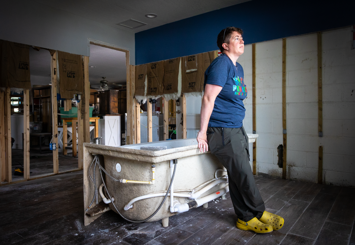 Dr. Meghan Martin in her St. Petersburg home on Oct. 3, 2024. Her house was gutted after Hurricane Helene flooded her floors with water from the bay.