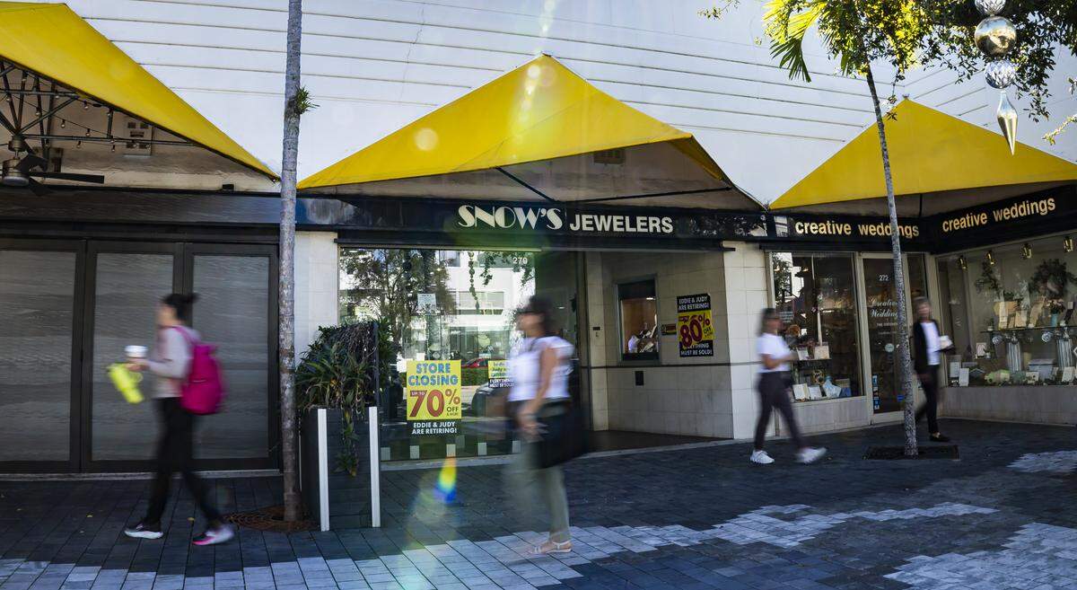 People make their way past Snow's Jewelers on Friday, Jan. 9, 2025, in Coral Gables, Fla. The jewelry shop, which has operated for more than 50 years, is closing its Miracle Mile location as owners Eddie and Judy prepare to retire in April.