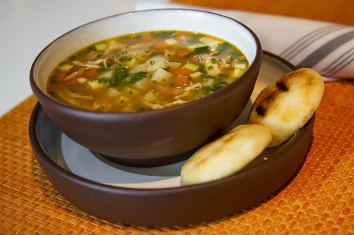 Venezuelan chef, Carlos García, donates the proceeds from his soup at Obra to a non-profit that helps feed people in Venezuelan hospitals.
