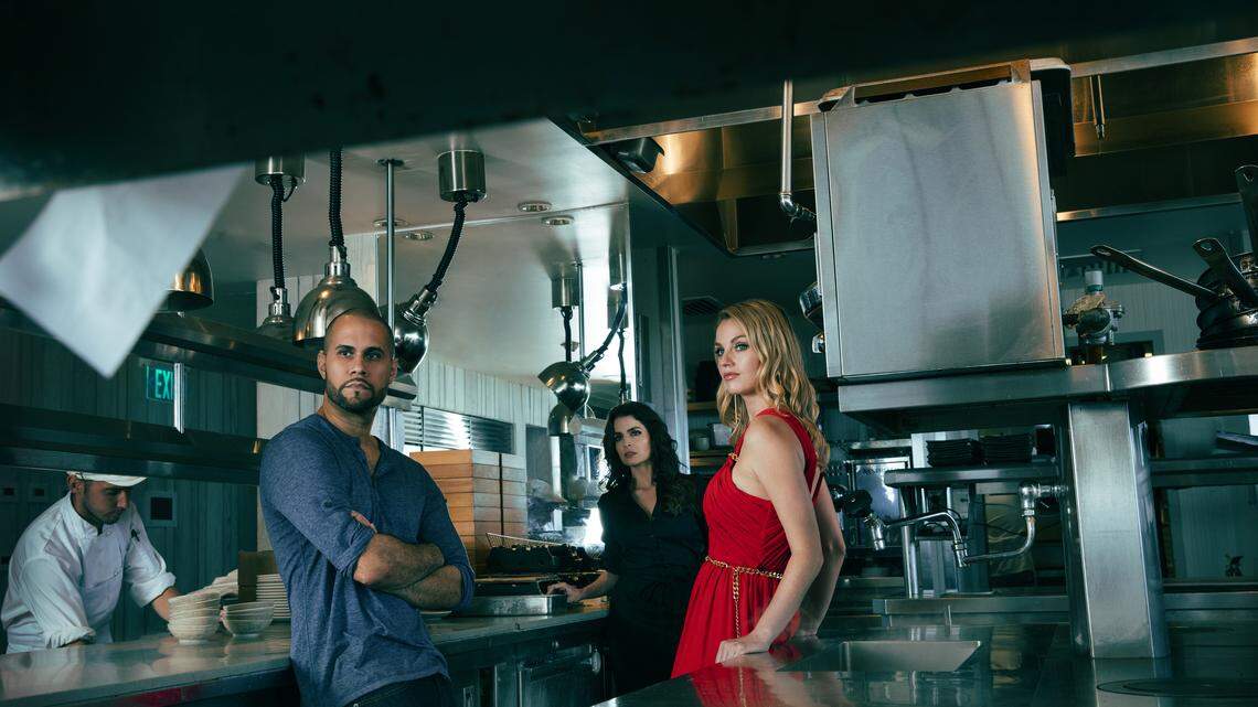 Rudi Goblen, Daniela Bascope and Betsy Graver find their characters’ lives intersecting in a hotel kitchen in Miami New Drama’s “Queen of Basel.”