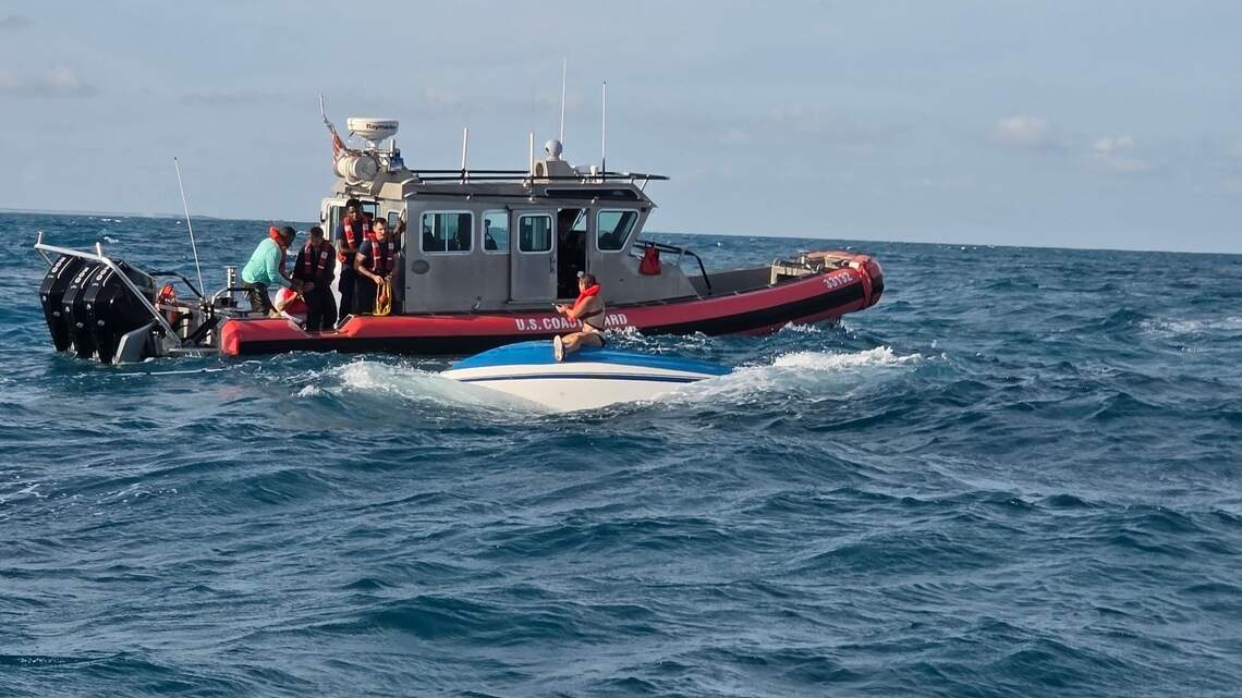 Coast Guard rescues three from capsized boat off Florida Keys