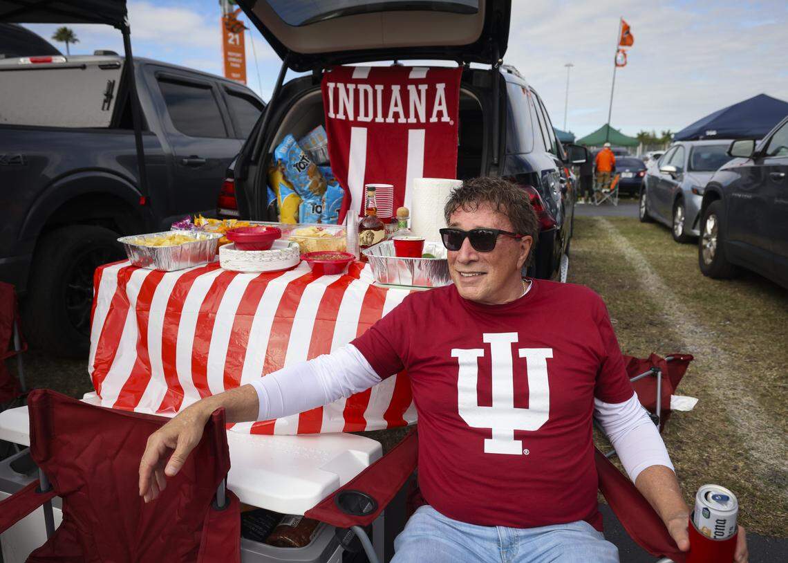 Jeff Kruger, who went to undergrad at Indiana, poses at his tailgate outside the stadium before the College Football Playoff National Championship Game between the Miami Hurricanes and the Indiana Hoosiers at Hard Rock Stadium on Monday, Jan. 19, 2026 in Miami Gardens, Fla.