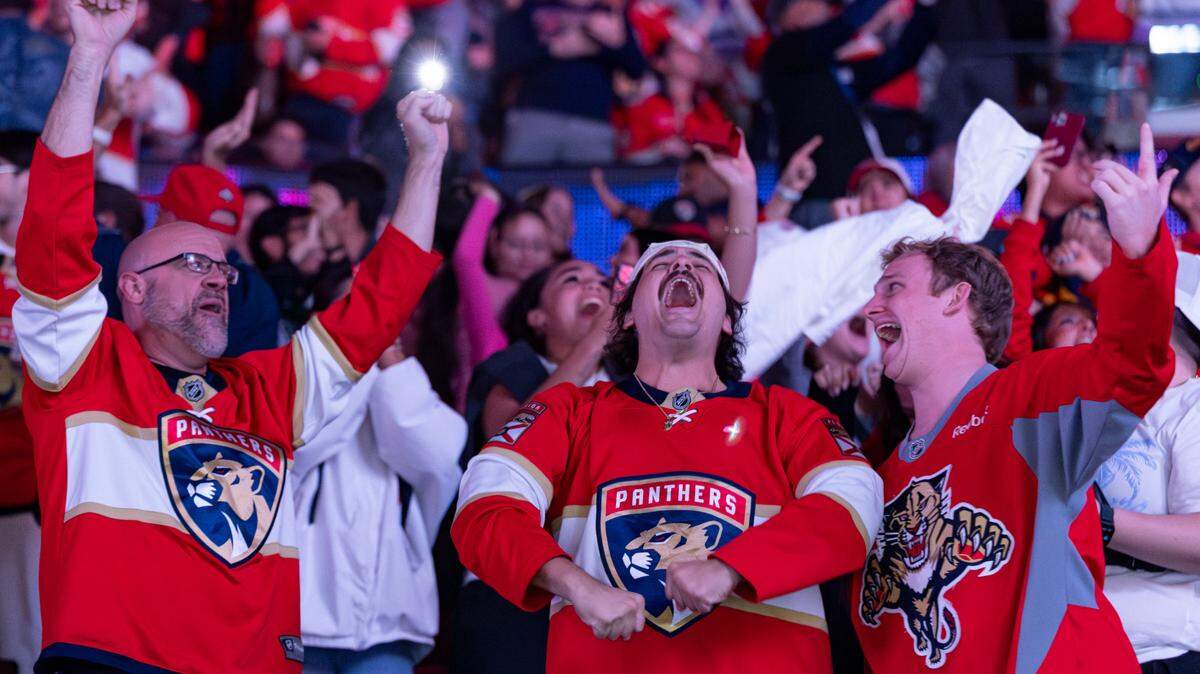 Florida Panthers fans react during a watch party after their team scored against the Edmonton Oilers in Game 1 of the NHL Stanley Cup Final at the Amerant Bank Arena on Wednesday, June 4, 2025, in Sunrise, Fla.