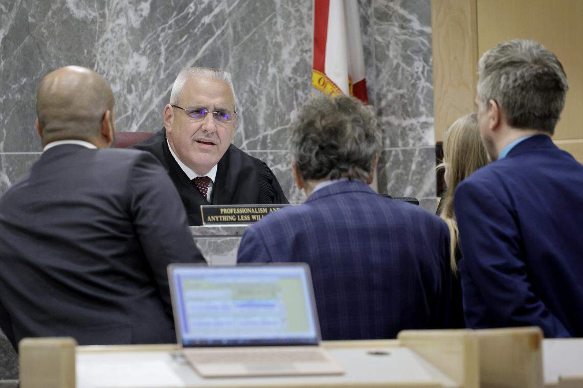 Judge Martin S. Fein confers with attorneys in the case of Cortlen Henry, known as the rap star YNW Bortlen, in a Broward County courtroom in Fort Lauderdale on Tuesday, Sept. 9, 2025. Henry pleaded no contest to accessory to murder in the shooting deaths of rappers Anthony “YNW Sakchaser” Williams and Christopher “YNW Juvy” Thomas Jr. Prosecutors say Henry was the driver when YNW Melly opened fire, then helped stage the scene to look like a drive-by. (Mike Stocker/South Florida Sun Sentinel)