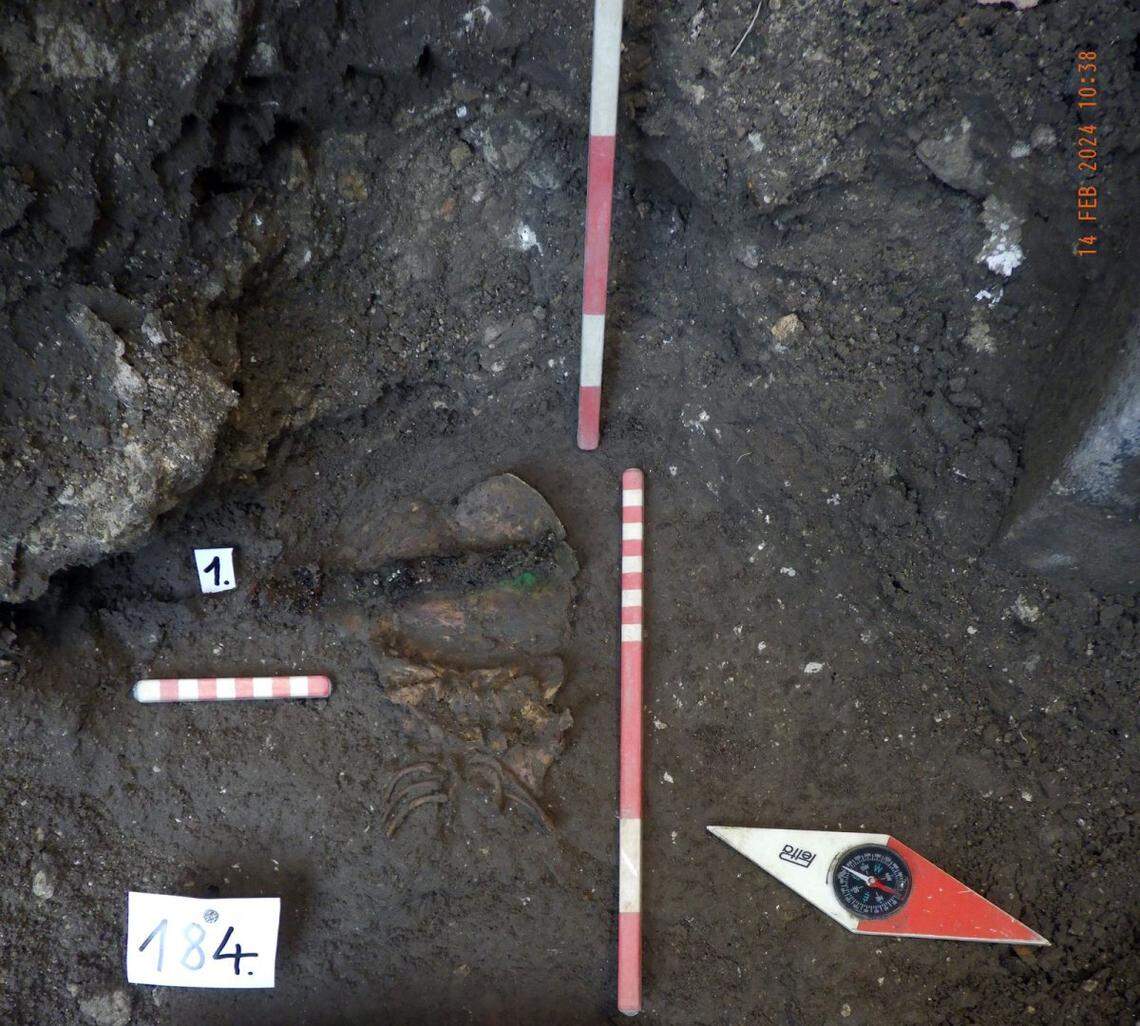 The baby was buried with an ornate headband typical of the 17th century, according to researchers.