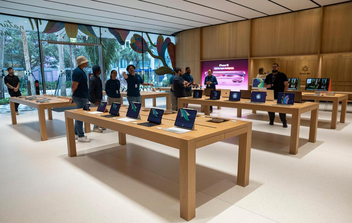 A general view of the inside of the new Apple Miami Worldcenter store during a media preview on Wednesday, Jan. 22, 2025, in downtown Miami, Fla. Apple is set to open its newest store in downtown Miami on Friday, featuring a dedicated pickup area and a biophilic garden.