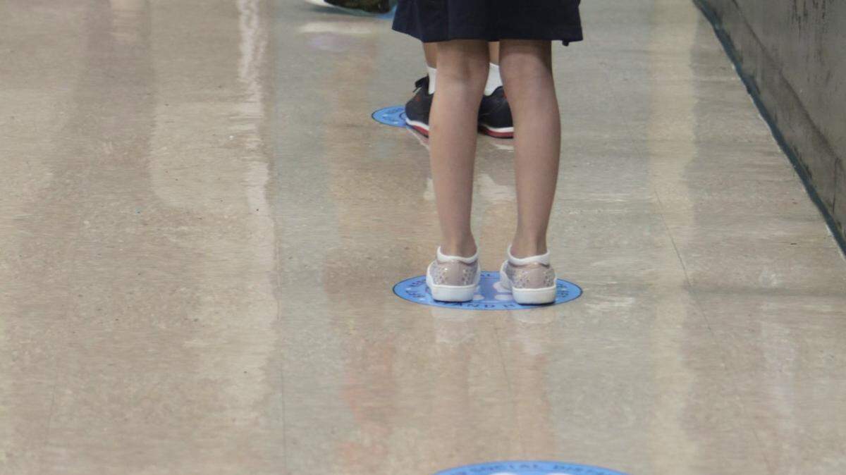 Students maintain social distancing in Redland Elementary’s cafeteria on Oct. 5, 2020, the first day of school reopenings in Miami-Dade. As schools begin in August 2021, experts offer tips on how to allay a child’s anxiety.