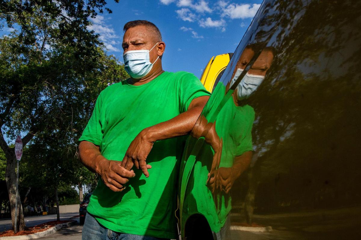 Erlyn Castillo, a day laborer from Honduras who just got his first COVID-19 shot, talks about his experience in North Miami on Thursday, May 6, 2021.