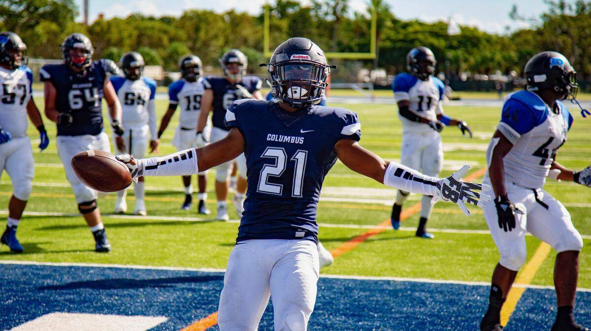 Christopher Columbus High School running back  Henry Parrish (21) celebrates in the endzone after scoring his second touchdown of the day during the second quarter of a Region 4-8A final against South Dade Senior High School at Tropical Park Stadium in Miami, FL, on Friday, November 23, 2018.