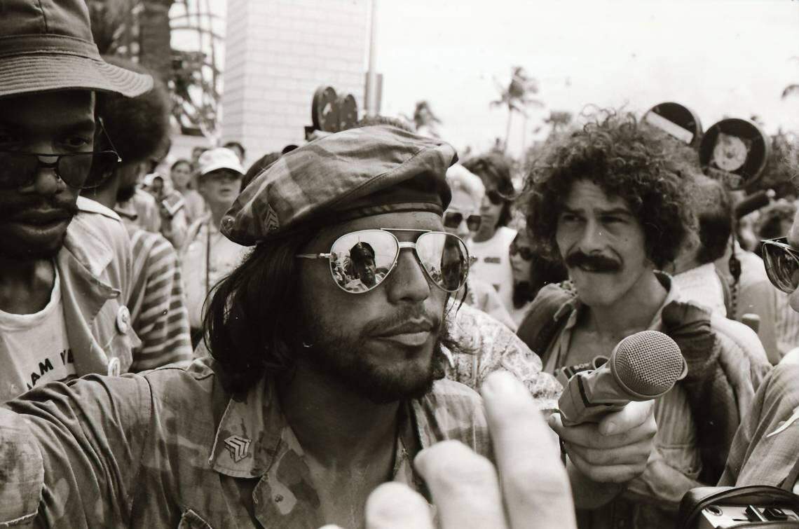 Protesters talk with police outside the 1972 Republican convention.