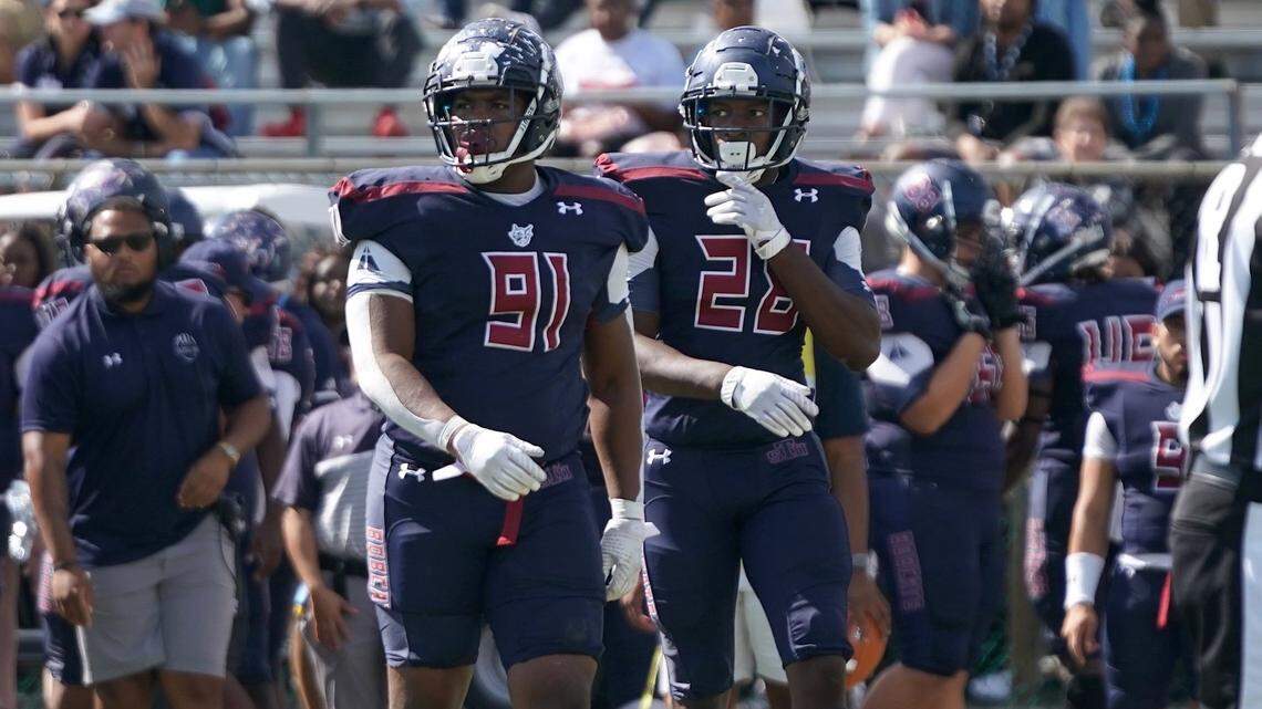 St. Thomas University star Michael Torrence has strong football bloodlines