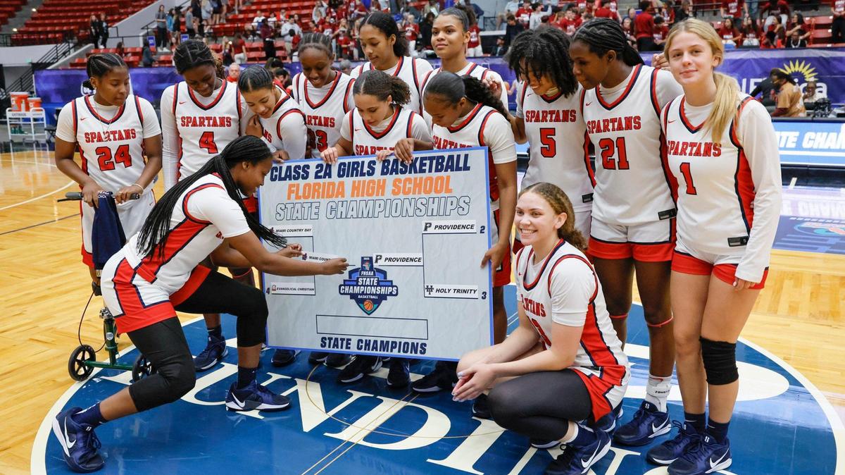 Miami Country Day celebrates after defeating Evangelical Christian for girls basketball state semifinal of the Florida High School State Championships at the RP Funding in Lakeland, Florida on Thursday, February 27, 2025.