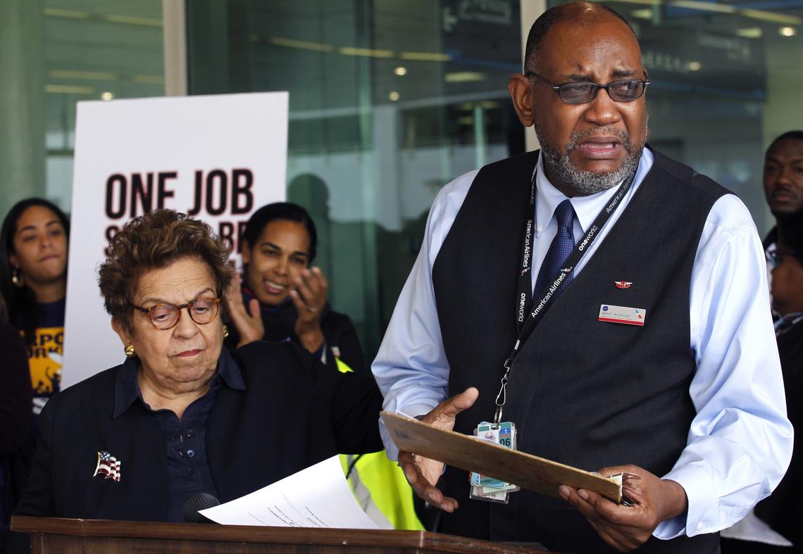 Congresswoman-elect Donna Shalala listens as James McKnight addresses employees about the death of an employee at work and the need for fair wages.