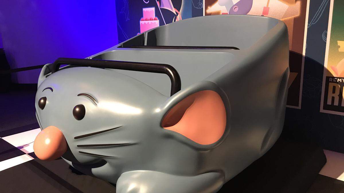 The ride car for Reny’s Ratatouille Adventure will be a six-person trackless vehicle with the face of a whiskered rat on the front.