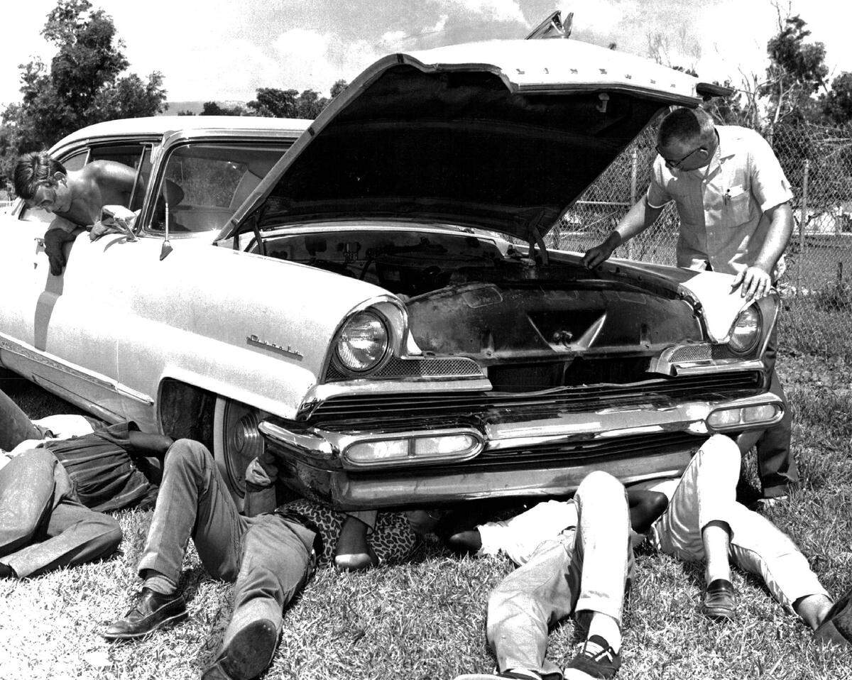 A Kendall Youth Home shop class working on a donated ’56 Lincoln. in 1967.