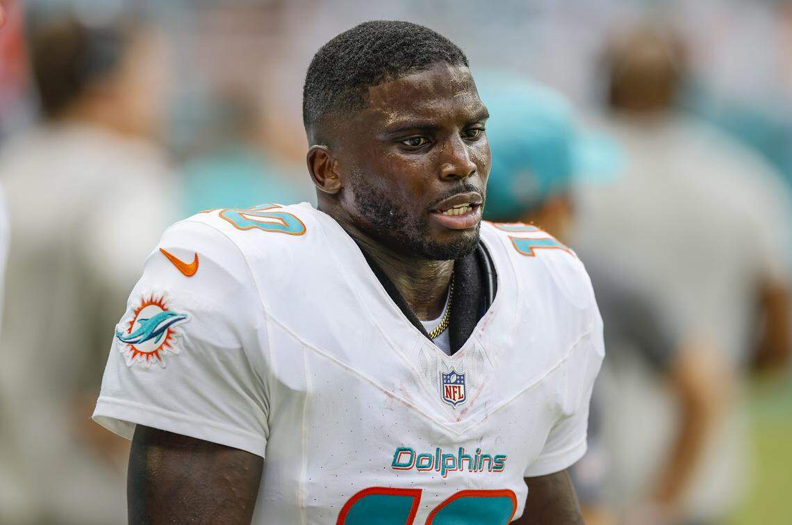Miami Dolphins wide receiver Tyreek Hill (10) on the sidelines late in the fourth quarter during the game against the New England Patriots at Hard Rock Stadium in Miami Gardens, Florida, on Sunday, Sept. 14, 2025.