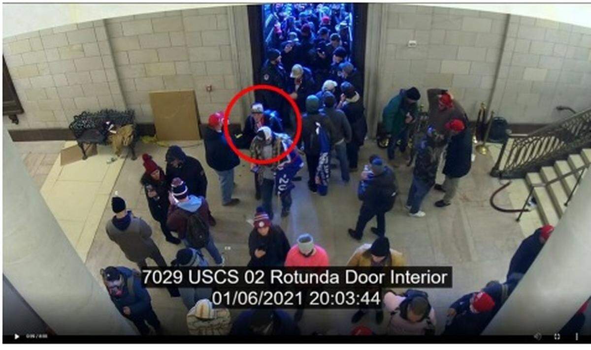 Screenshot from video footage allegedly shows Julio Chang in the Rotunda of the Capitol building on the afternoon of Jan. 6. Chang (circled) is seen wearing the same clothing he had on in a photo posted on social media. The image was included as evidence on an FBI filing with a Washington federal court on Sept. 23, 2021.
