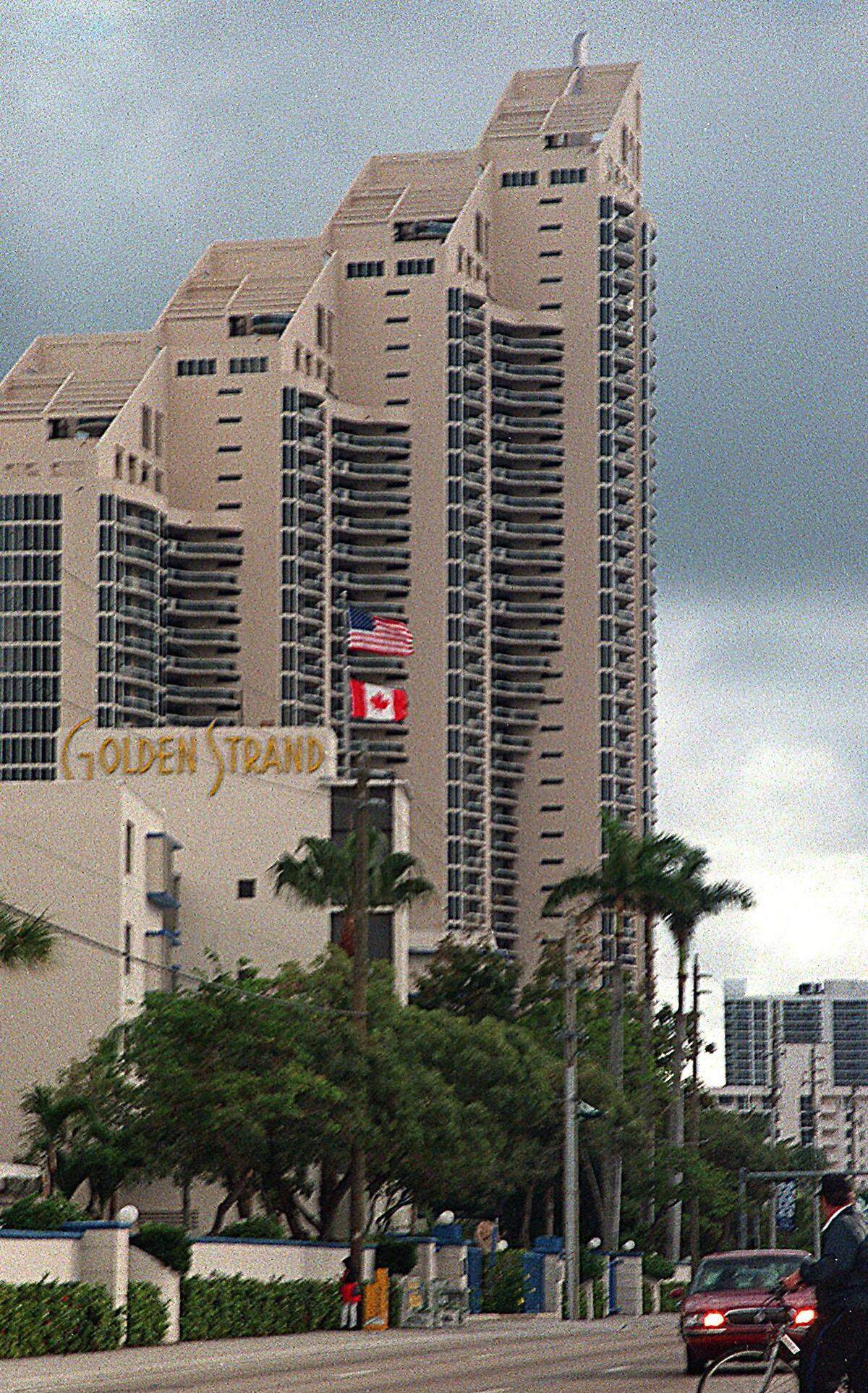 Once dominated by a row of neon-lit ‘mom and pop’ motels on Collins Avenue, tiny Sunny Isles Beach is getting a new life thanks to a ’90’s luxury condo boom. The Pennacle dwarfs the Golden Strand one of the motels that has remained on the row.