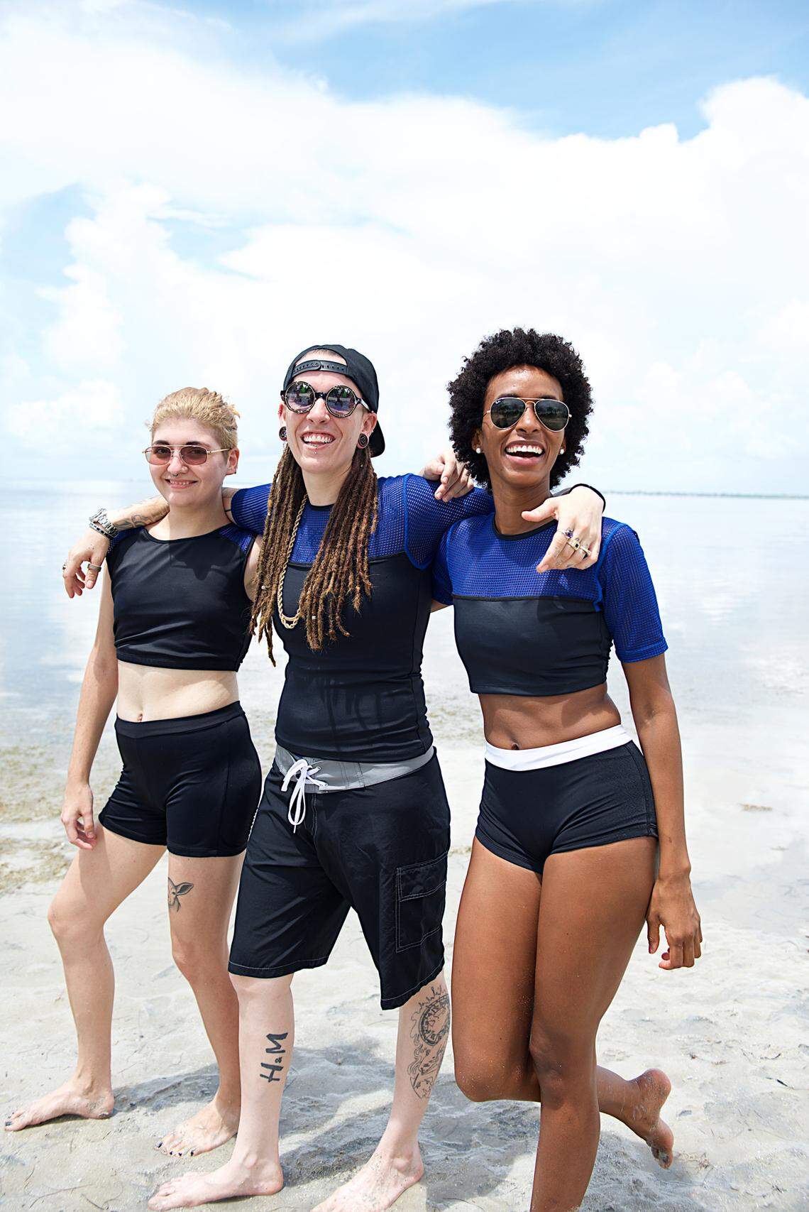 Models showcase gender-neutral swimwear made by Miami-based OutPlay.