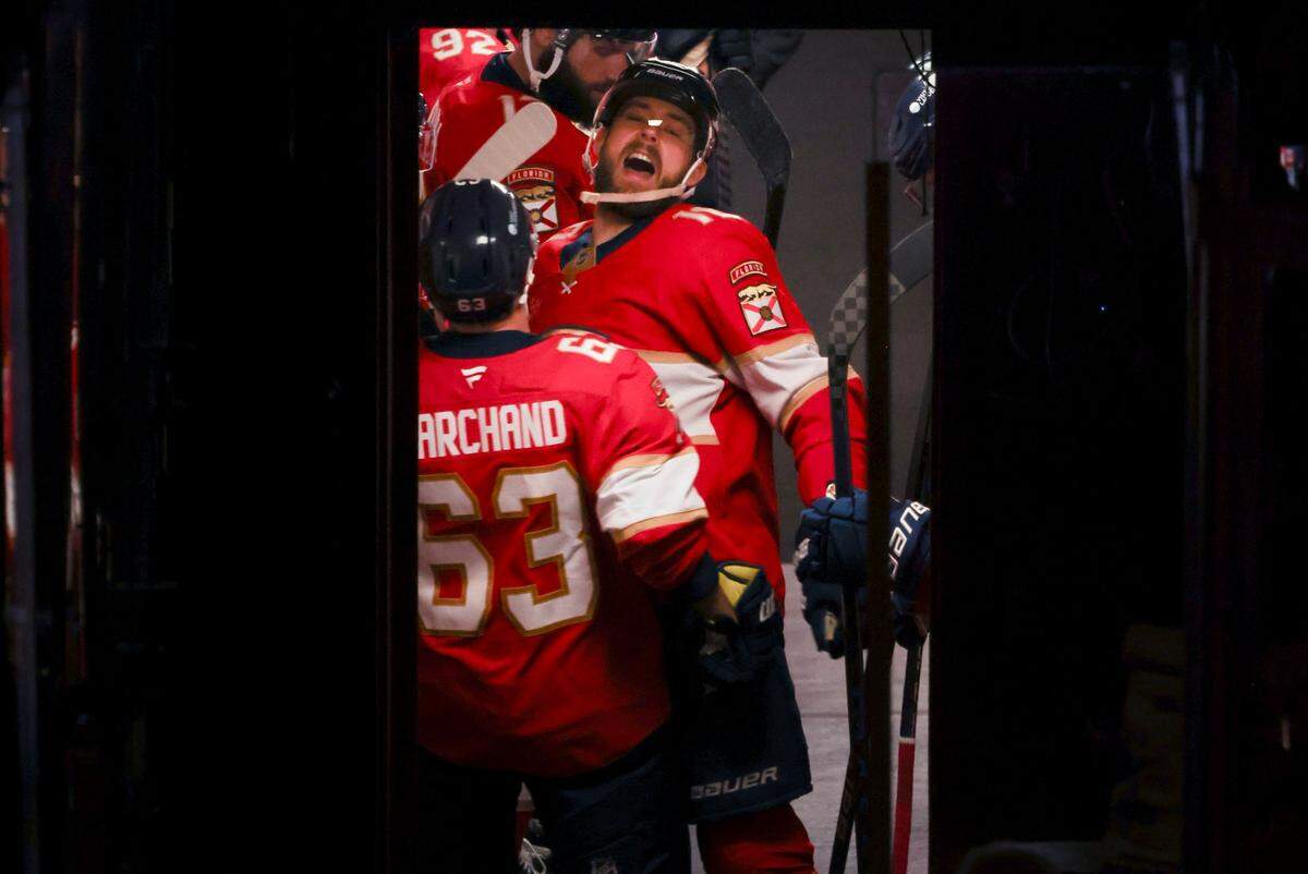 Florida Panthers left wing A.J. Greer (10) chest bumps center Brad Marchand (63) before Game 4 of a Stanley Cup playoffs second-round series on Sunday, May 11, 2025, at Amerant Bank Arena in Sunrise, Fla.
