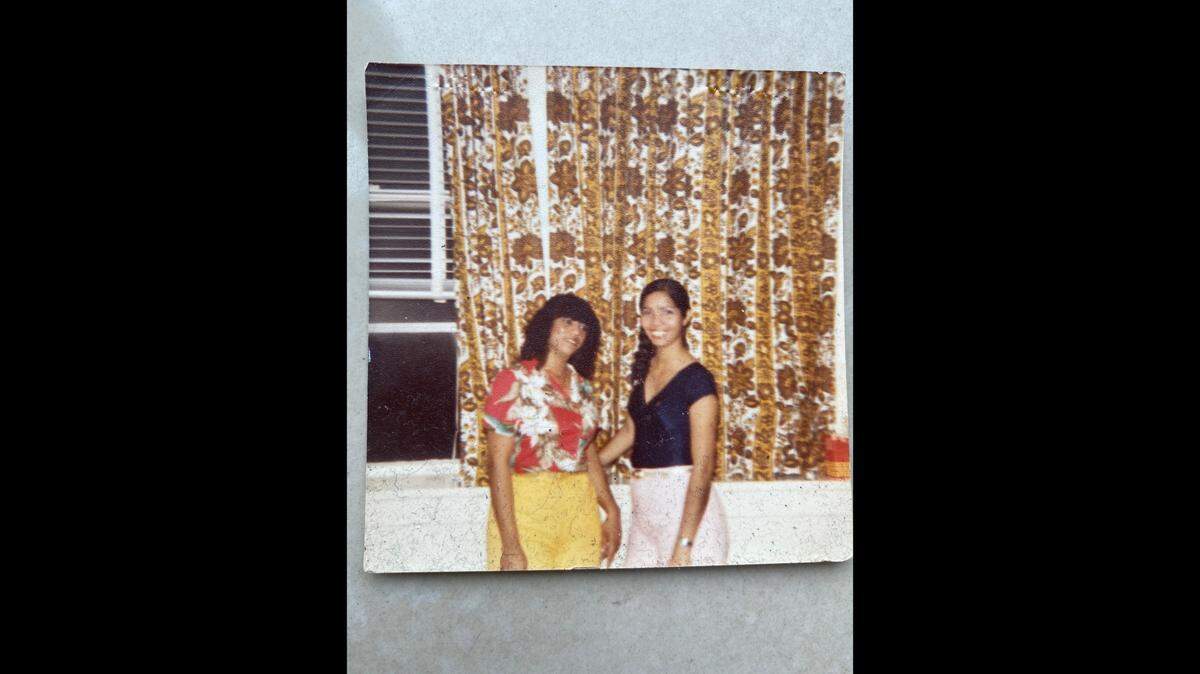 Michael Butler’s mother Nereida Mohamad (right) poses for a 1979 picture with her sister Soledad after coming to Chicago, Illinois from Panama.