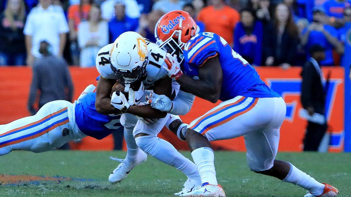 Dominic Gicinto #14 of the Missouri Tigers is tackled by Chauncey Gardner-Johnson #23 of the Florida Gators during the game at Ben Hill Griffin Stadium on Nov.r 3, 2018 in Gainesville. No. 15 Florida will try to avoid the same unfavorable fate that has claimed its past two weeks of competition when it hosts South Carolina at noon on Saturday.