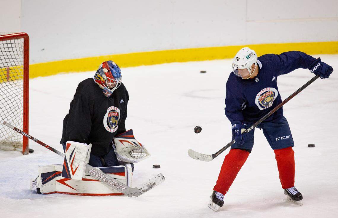 Florida Panthers goalie Sam Montembeault (33) defends the goal from Panthers right wing Patric Hornqvist (70) during training camp in preparation for the 2021 NHL season at the BB&T Center on Sunday, January 10, 2021 in Sunrise.