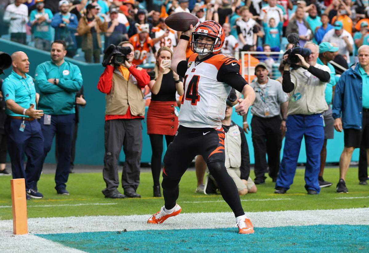 Cincinnati Bengals quarterback Andy Dalton (14) reacts after scoring a two point conversion in the final seconds of the fourth quarter as the Miami Dolphins host the Cincinnati Bengals at Hard Rock Stadium in Miami Gardens on Sunday, December 22, 2019.