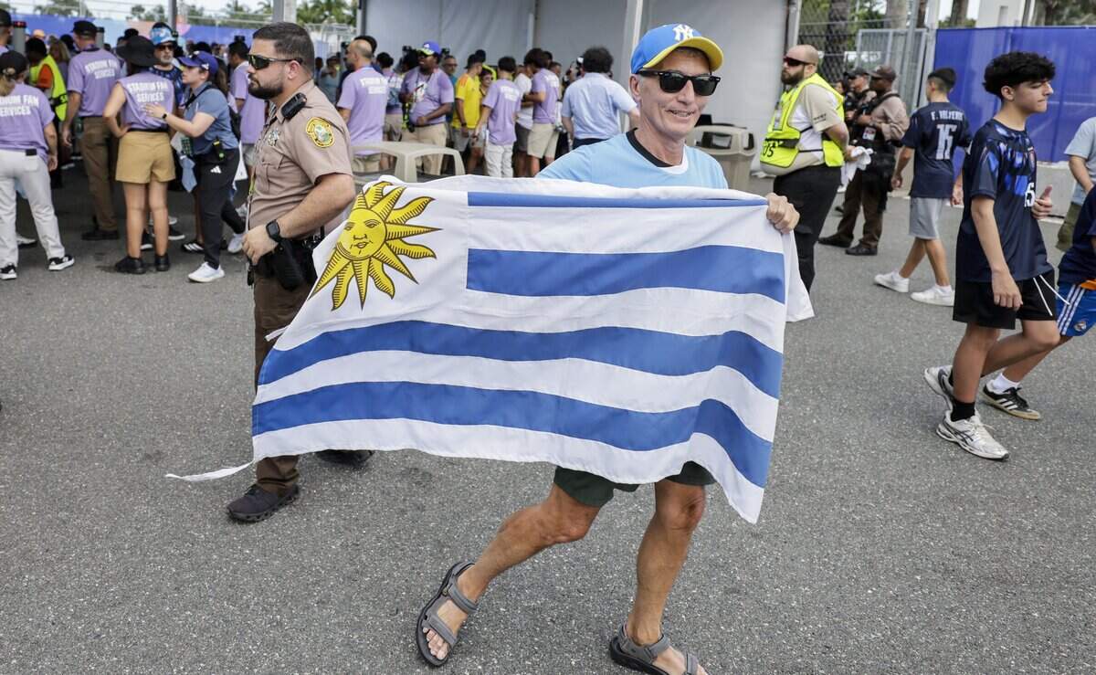Soccer fan Jorge Duque reacts he as he enters the gates for Uruguay against Saudi Arabia FIFA World Cup opening match at Miami Stadium on Monday, June 15, 2026.
