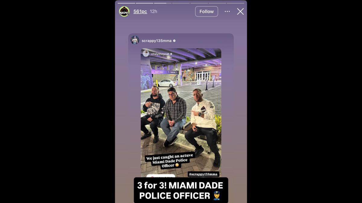 Miami-Dade Deputy Christopher Diaz is flanked by YouTuber Vitaly Zdorovetskiy, left, and MMA fighter Dustin Lampros in Delray Beach on Feb. 13, 2026, after Diaz allegedly tried to meet someone he thought was a 15-year-old girl. Zdorovetskiy and Lampros are part of 561 Predator Catcher.
