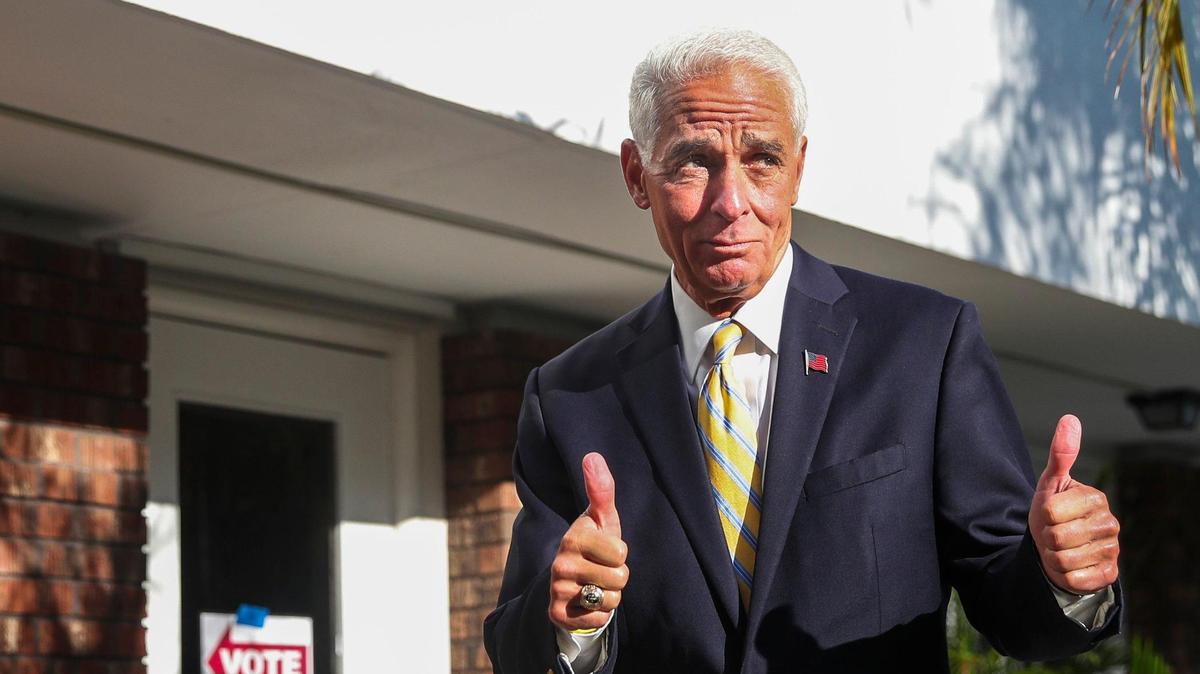 U.S. Rep. Charlie Crist give two thumbs up as he walks towards the polls to vote in person on Election Day at Gathering Church, 4400 Shore Acres Blvd NE, on Tuesday, Aug. 23, 2022 in St. Petersburg.