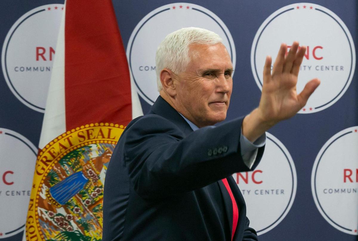 Former Vice President Mike Pence waves to the crowd after giving a speech at the Republican National Committee’s newly opened Jewish Community Center in Boca Raton on Monday.