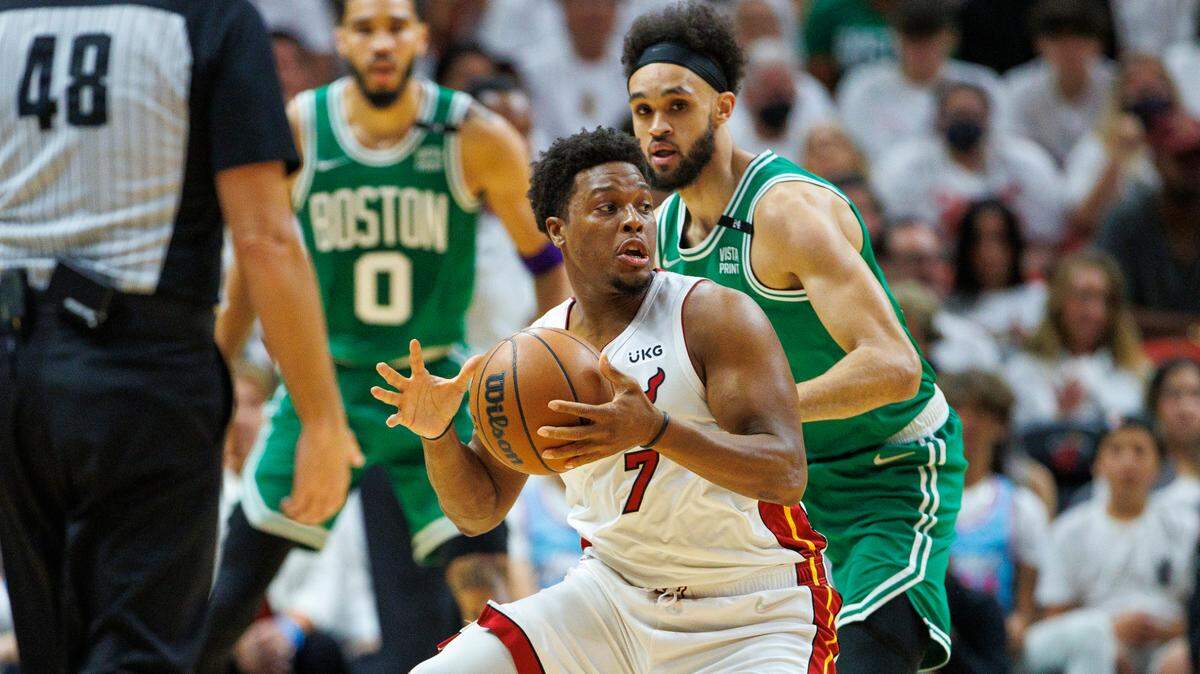 Miami Heat guard Kyle Lowry (7) drives against Boston Celtics guard Derrick White (9) during the first quarter of Game 7 of the NBA Eastern Conference Finals series at FTX Arena in Miami, Florida, on Sunday, May 29, 2022.