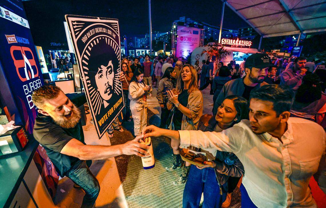 Guests vote for their favorite burger at the Pincho Burger booth during Burger Bash in 2025.