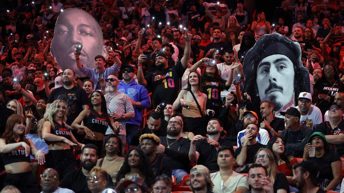 NBA fans dance in the stands during the game between the Miami Heat and the Dallas Mavericks at Kaseya Center in Miami on April 10, 2024.