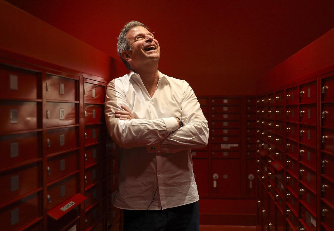 Developer Nir Shoshani, principal of NR Investments, in the mailroom at the new Canvas condo in Miami’s Omni district. Shoshani has proposed building a new city-subsidized project next door that would consist of 252 affordable and workforce apartments in a similar tower.