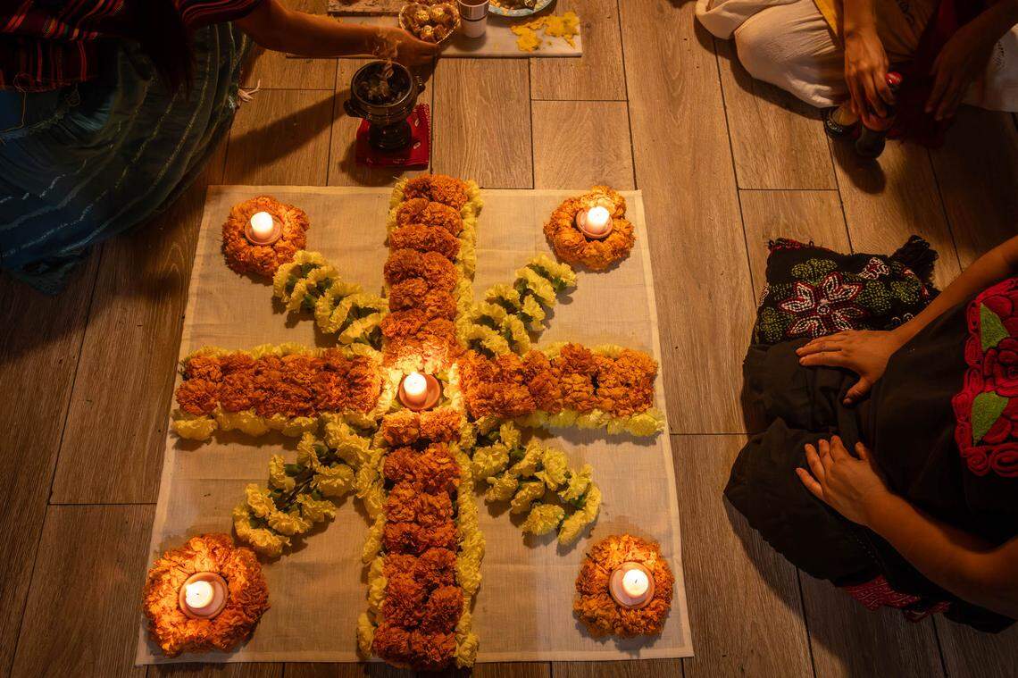 Offerings at a Día de los Muertos, or Day of the Dead, altar in Little Havana are photographed by Little Haiti photographer, Woosler Delisfort. His new exhibition at HistoryMiami, called “SANCTUARY: Our Sacred Place,” showcases the religious origins of Afro-Caribbeans populations in Miami.
